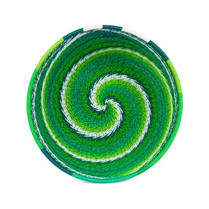 Large round woven basket with green, teal, and white stripes, perfect for home storage or decorative bowl.