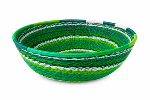 Large round woven basket with green, teal, and white stripes, perfect for home storage or decorative bowl.