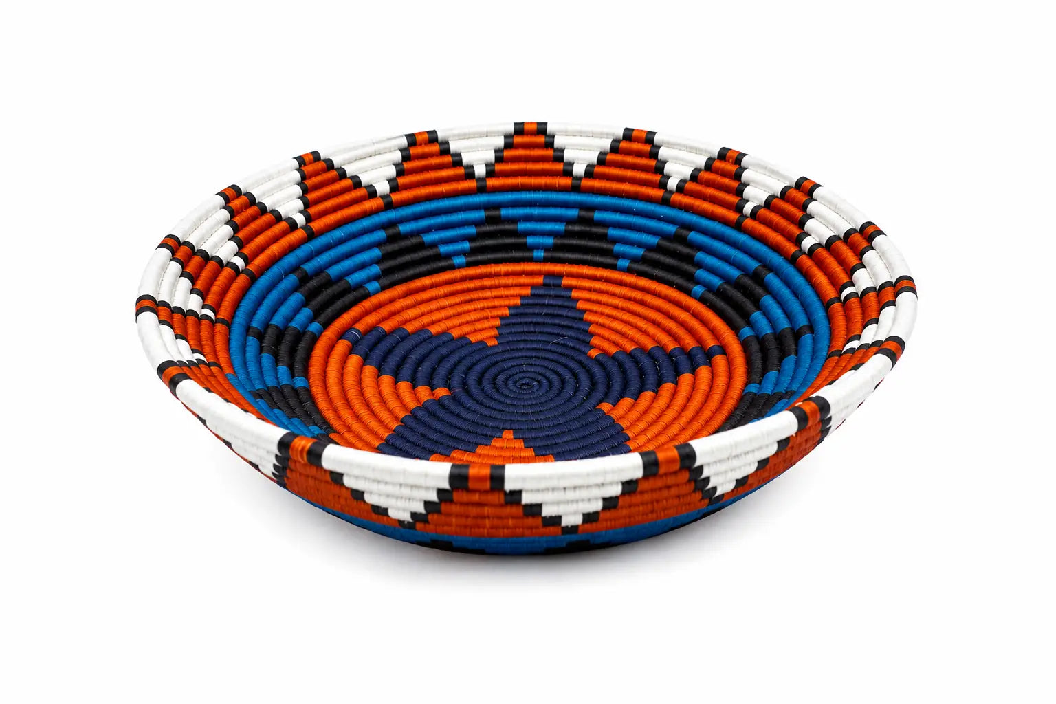 Vibrant handwoven decorative basket bowl with geometric orange, blue, and white patterns on a white background.