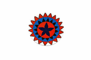 Hand-woven circular wall basket with a vibrant geometric blue star design and orange patterns on a white background.